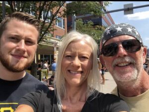 A selfie of three people, son Elijah Englehart on the left, mother, Susan in middle, and father, Jerry on the right